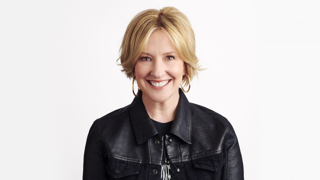 Headshot of Brene Brown, a keynote speaker on mental health, wellbeing, mindfulness, and meditation 