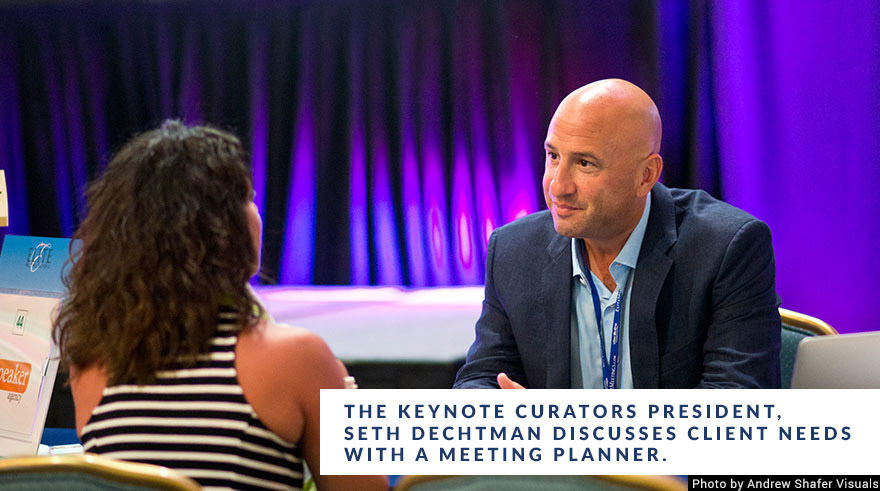 The Keynote Curators President, Seth Dechtman discusses client needs with a meeting planner.