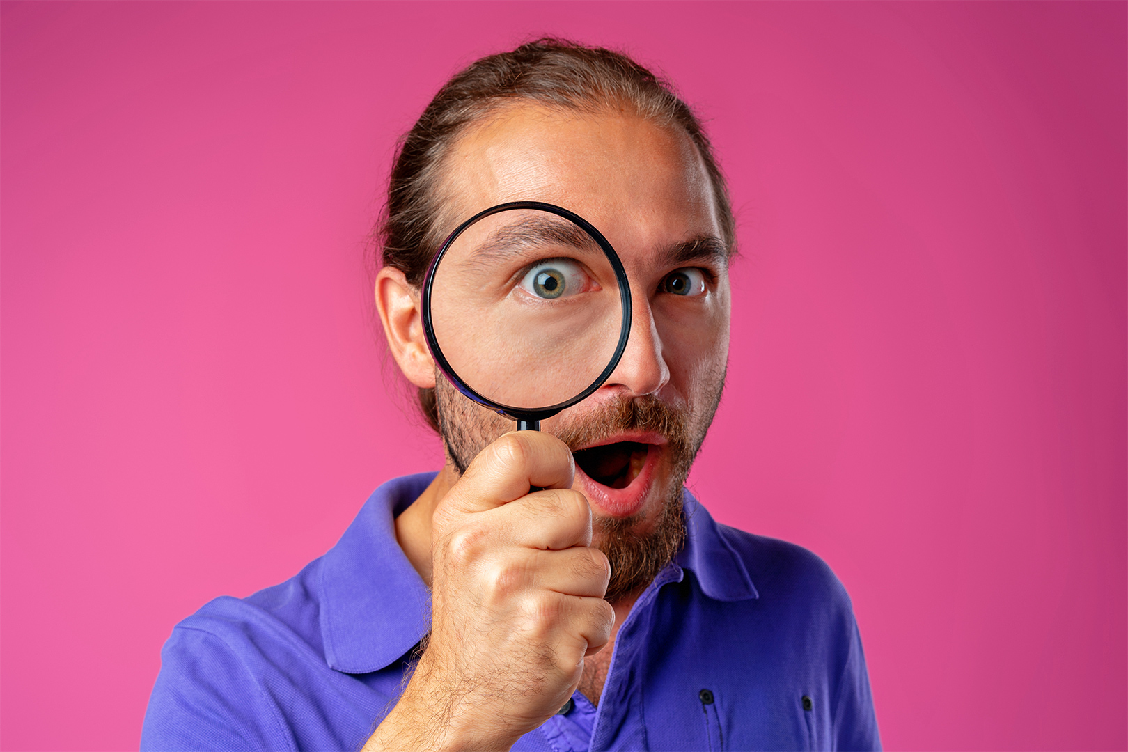 Man holding a magnifier glass