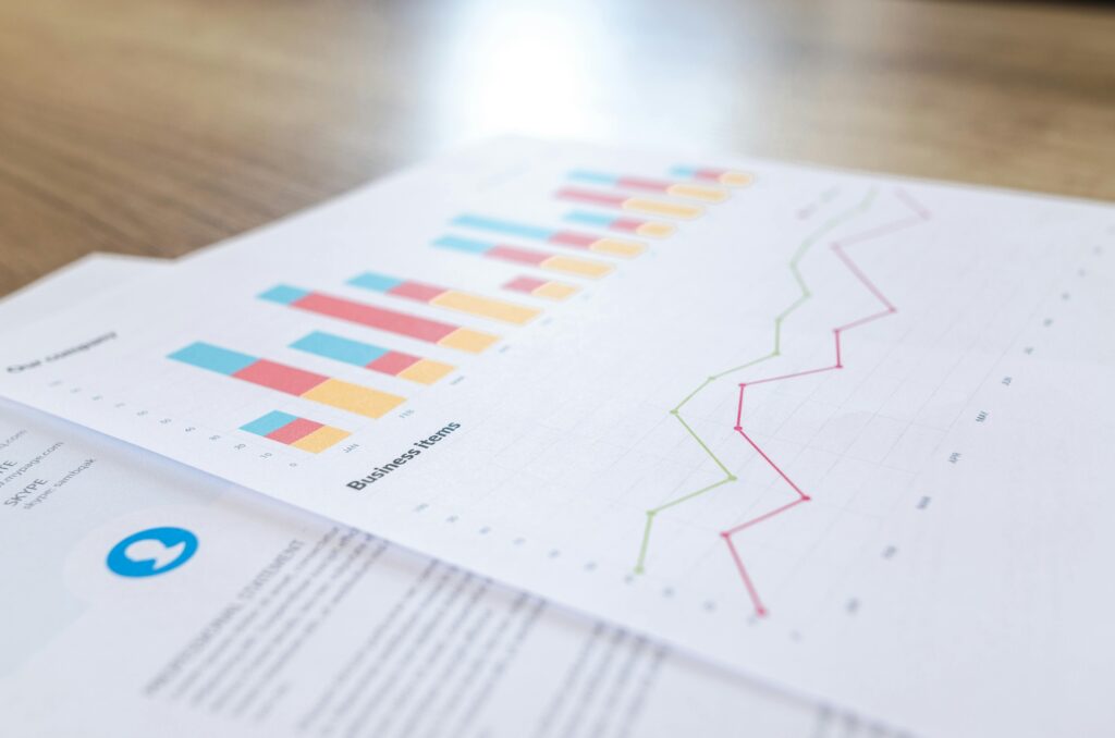 a paper with colorful graphs and numbers on it displaying figures around customer experience