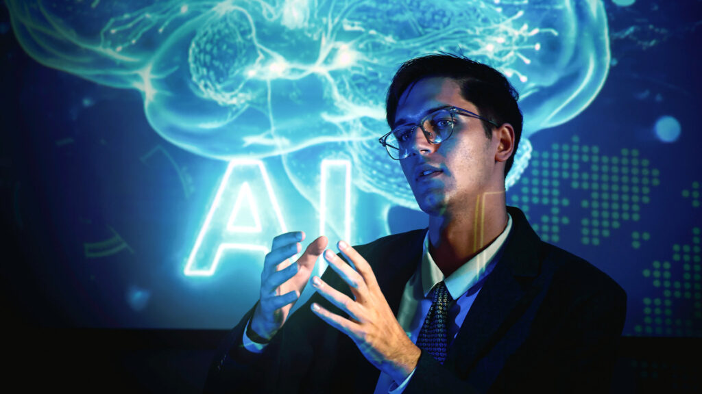 Expert speaker presenting insights on AI and ethics, highlighting how technology and leadership will shape decision-making in 2026.