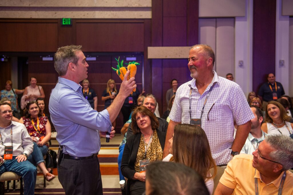 Purpose keynote speaker Adrian Gostick in action at a live event session