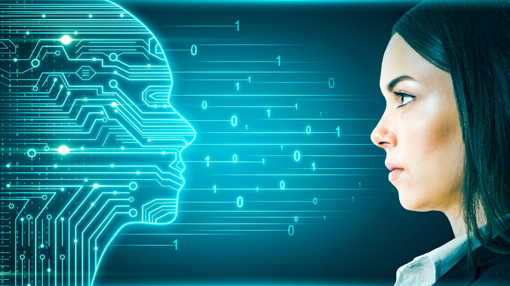 A woman looks at a glowing blue profile of a head made from circuits to represent AI.